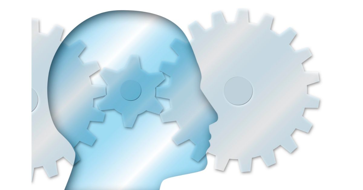 A digital illustration of a head with gears inside, symbolizing cognitive function and mental processes.
